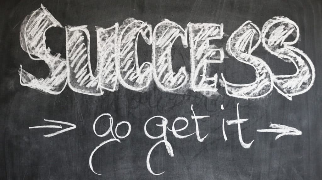 chalkboard with "Success" written on it